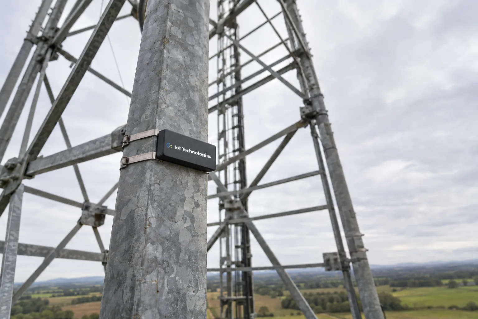 ZARC sway and movement monitoring tag strapped to the steel leg of a lattice mast